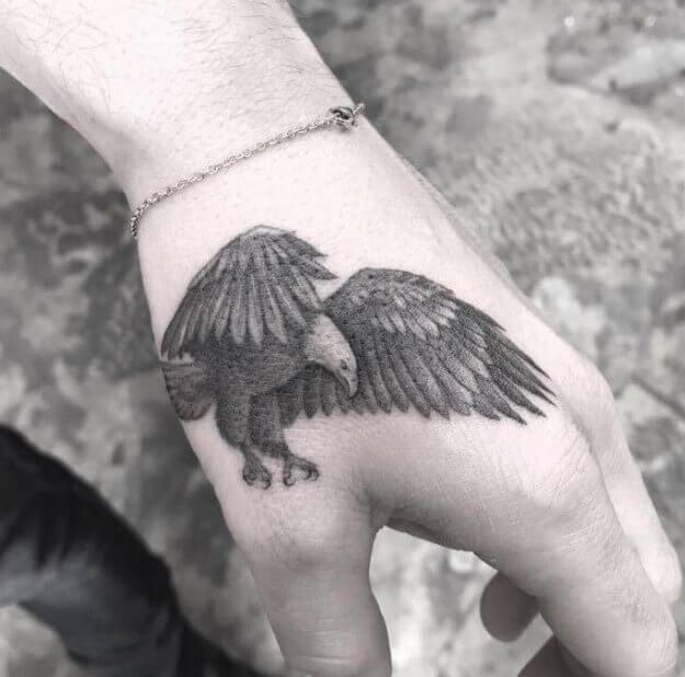 TATTOO OF AN EAGLE ON HAND