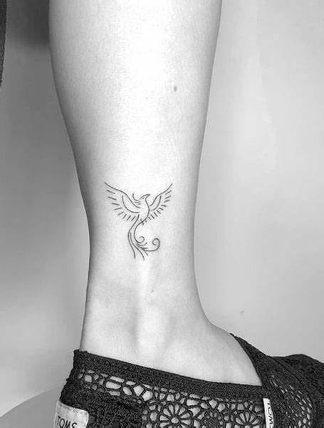 13. Minimalist Phoenix Tattoo