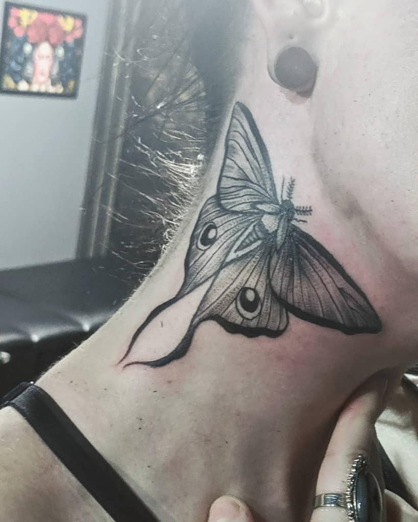 Moth Tattoo On Woman's Neck Neck