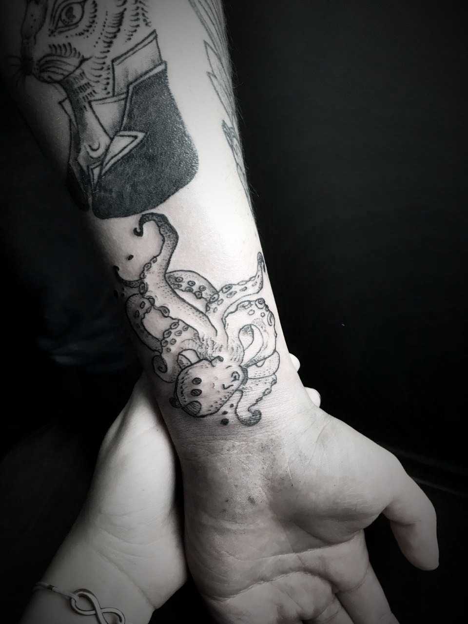 Octopus wrist tattoo