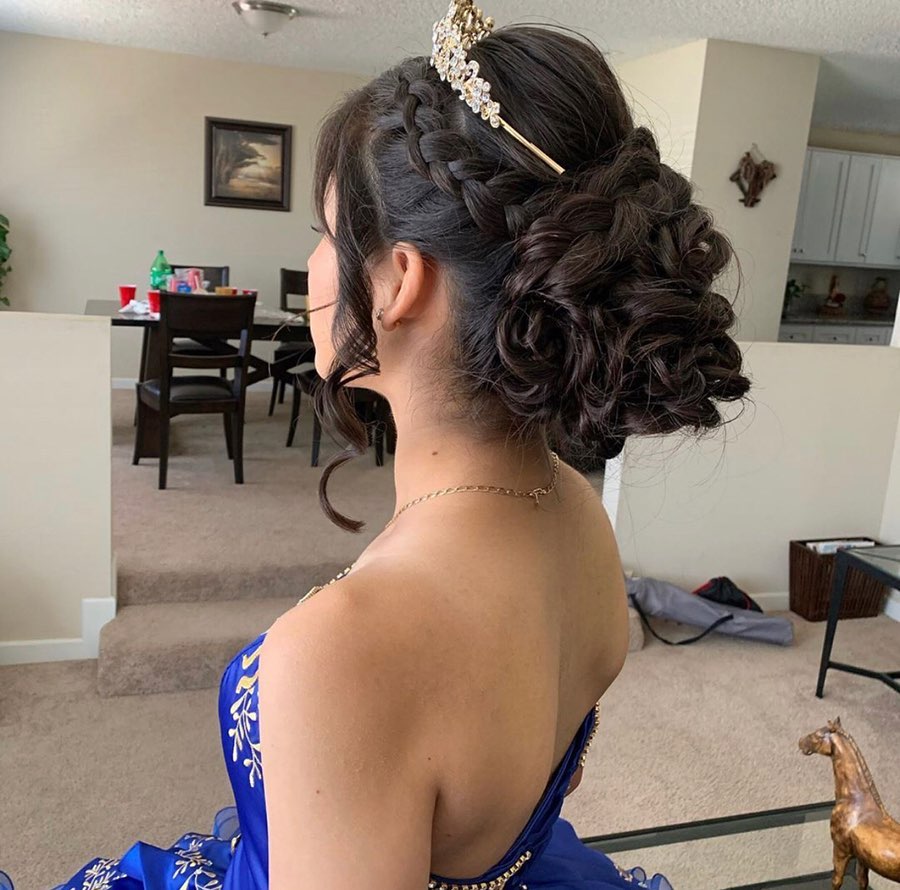 braided wavy bun quinceanera 