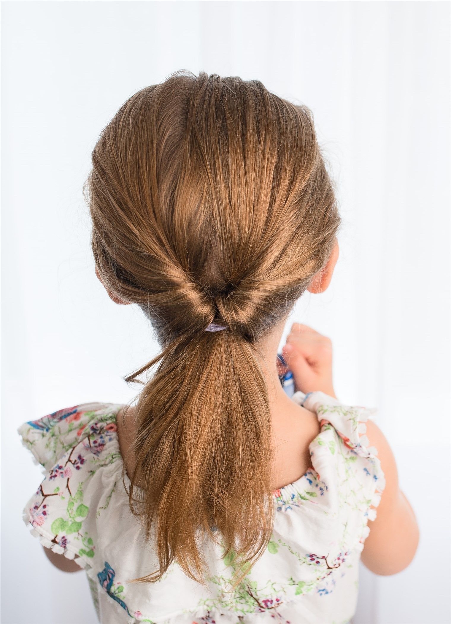 Twisted Ponytail Hairstyle For Kids