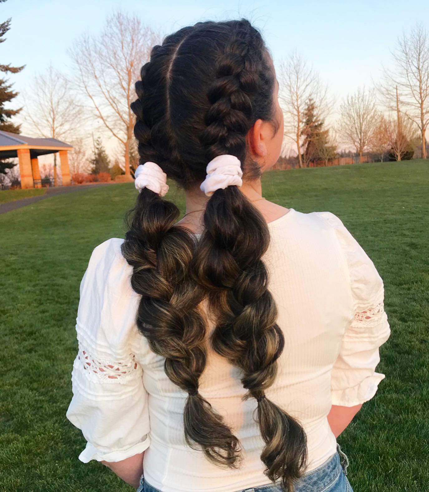 tight dutch braids into big fluffy three strand braids