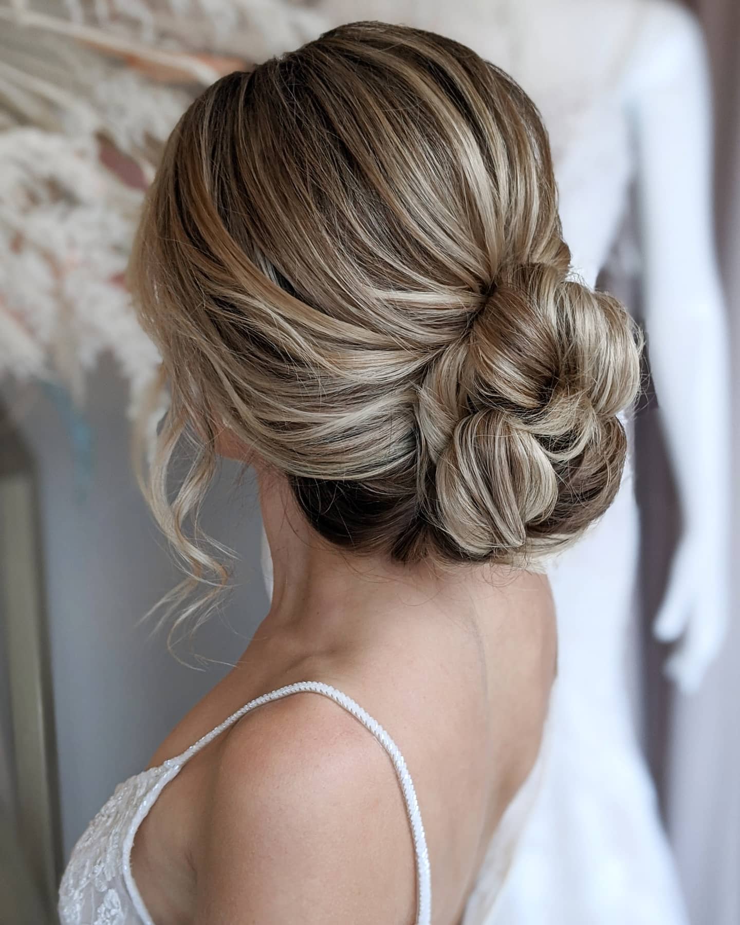 Whimsical low Bun 